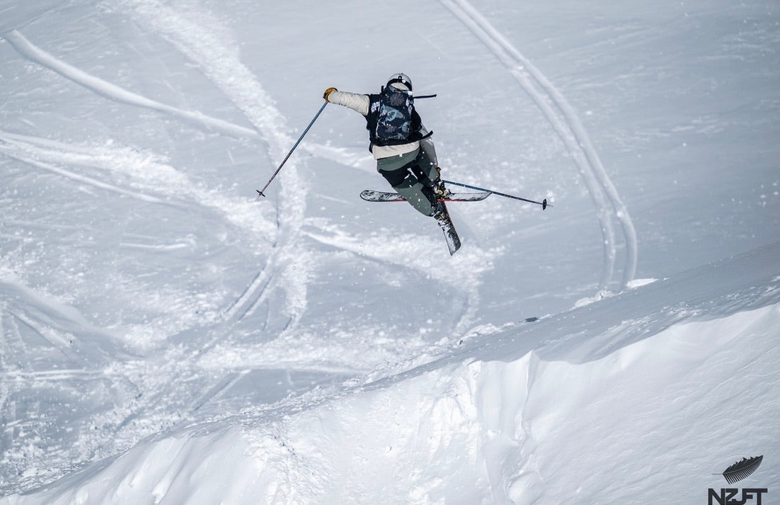 Skiers on mountain terrain