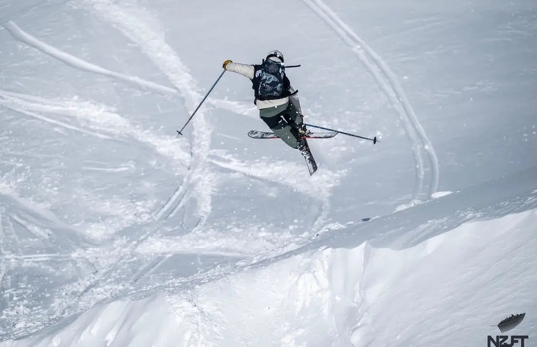 Skiers on mountain terrain