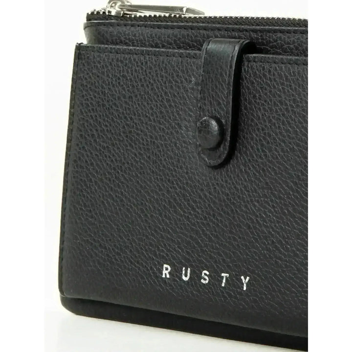 Rusty Grace Leather Pouch features RFID blocking & zip closure. 