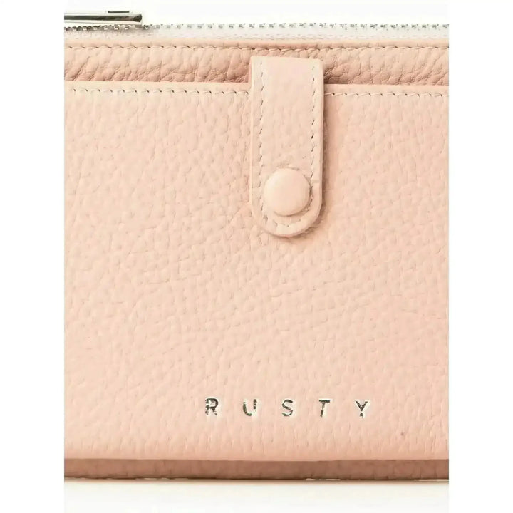 Rusty Grace Leather Pouch features RFID blocking & zip closure. 