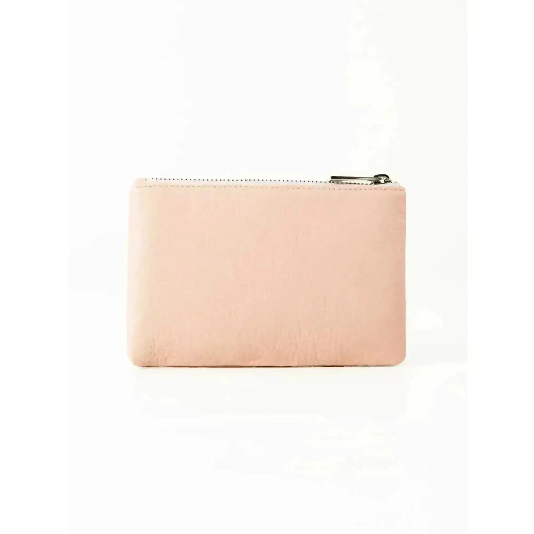 Rusty Grace Leather Pouch features RFID blocking & zip closure. 