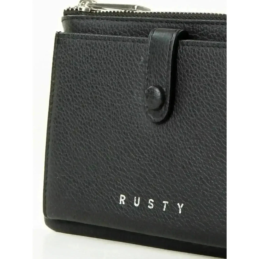 Rusty Grace Leather Pouch features RFID blocking & zip closure. 