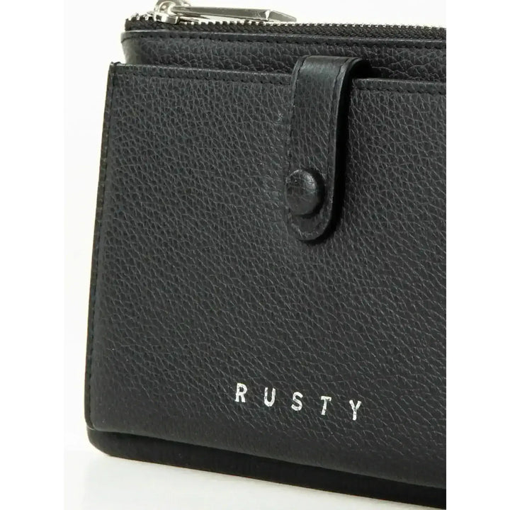 Rusty Grace Leather Pouch features RFID blocking & zip closure. 