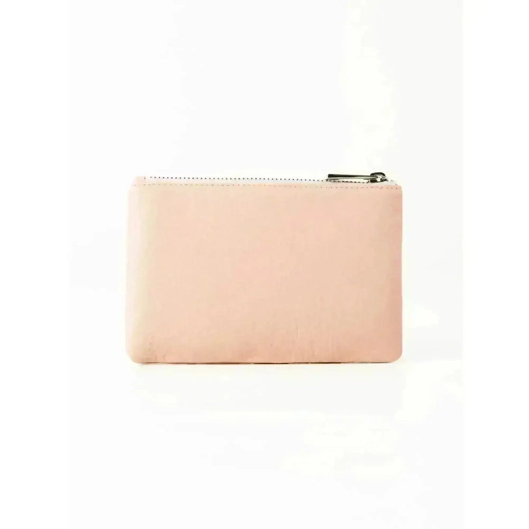 Rusty Grace Leather Pouch features RFID blocking & zip closure. 