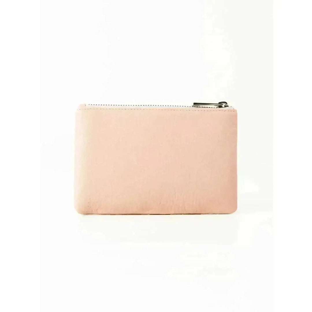 Rusty Grace Leather Pouch features RFID blocking & zip closure. 
