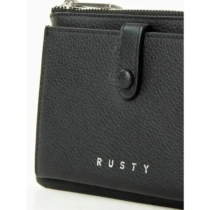 Rusty Grace Leather Pouch features RFID blocking & zip closure. 